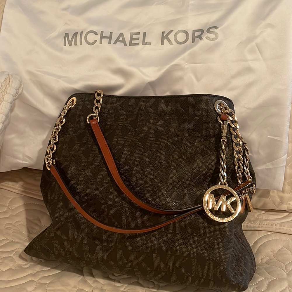 MK handbag , like new.  Dust bag included.  Only used once.  Just like new